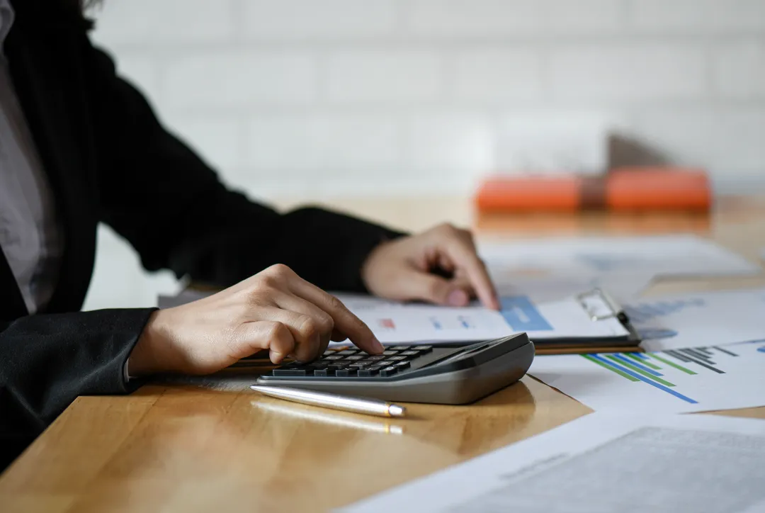 Close-up of an employment contract being reviewed, representing documentation practices under brazilian accounting standards